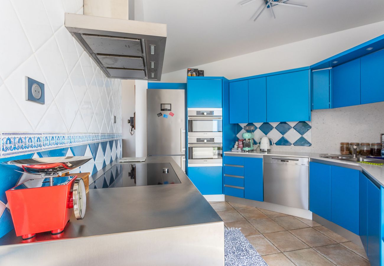 Kitchen opening onto the terrace