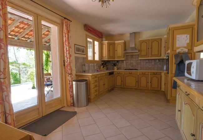 Spacious, Well-Equipped Kitchen with Terrace Doors at Mas de Charles, Lorgues, Provence